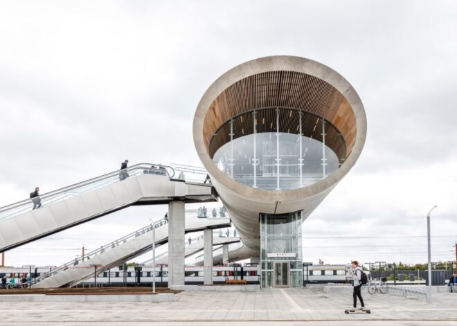 metal tube-like footbridge with round window