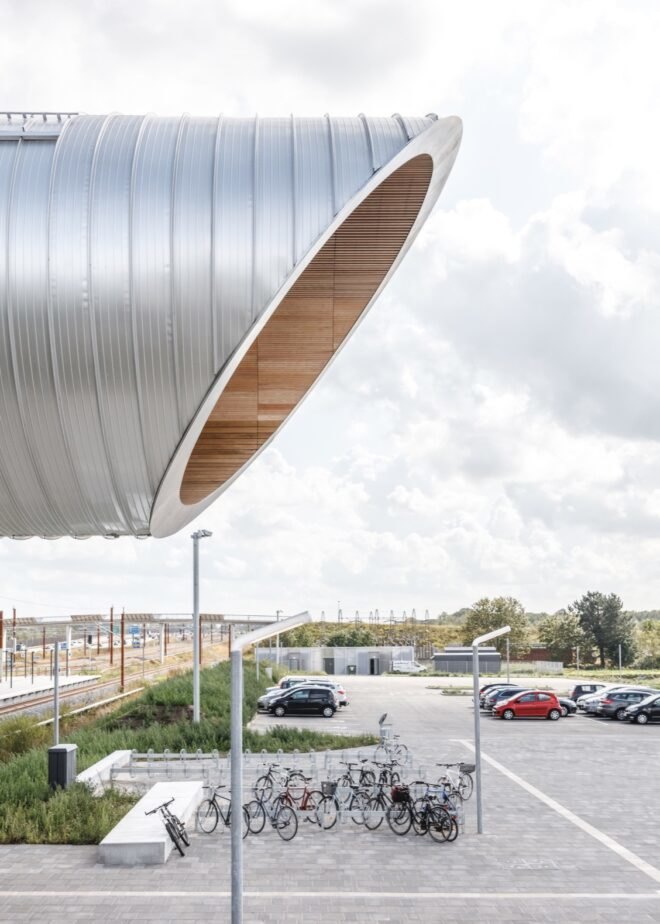close-up of rounded metal end of a footbridge