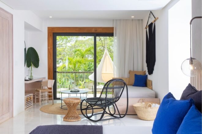 room with large sliding glass doors and mid-century modern furniture
