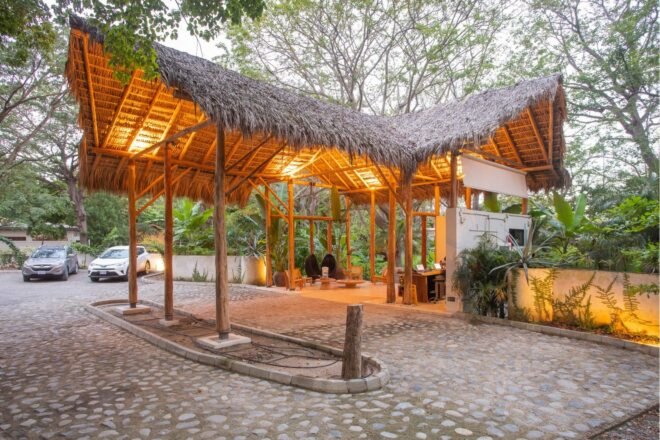 thatched roof entryway to hotel