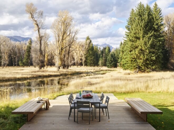 pavilion area with wooden deck and outdoor furniture