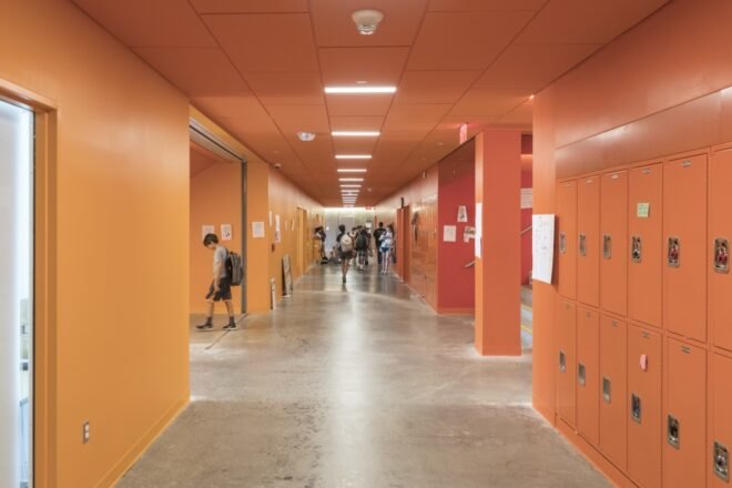 hallway with orange walls