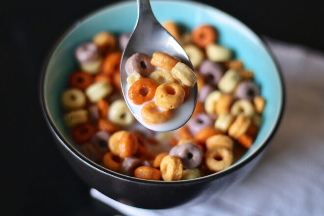 multicolored cereal and milk in a bowl