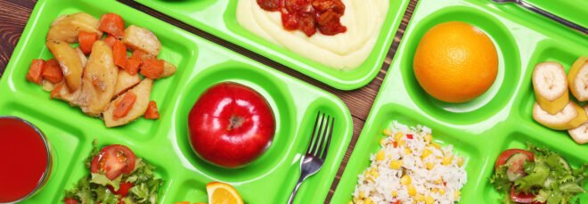 lunch items on green trays