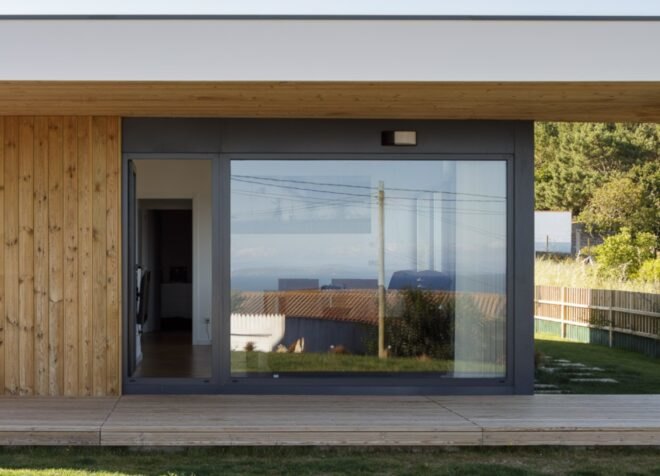 deck leading to glass wall of a home