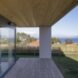 wood deck leading to yard with wood picket fence