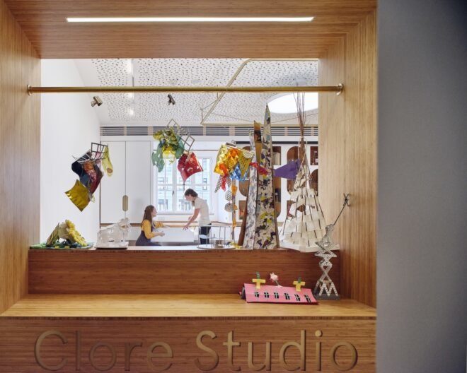 architecture designs on display on wooden shelves