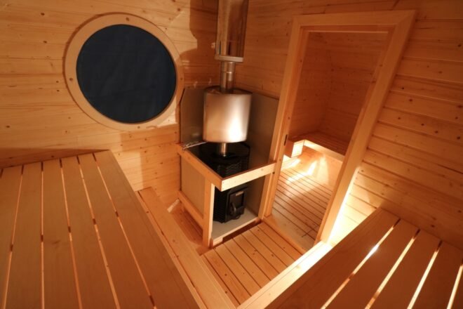 interior of oval-shaped wooden sauna