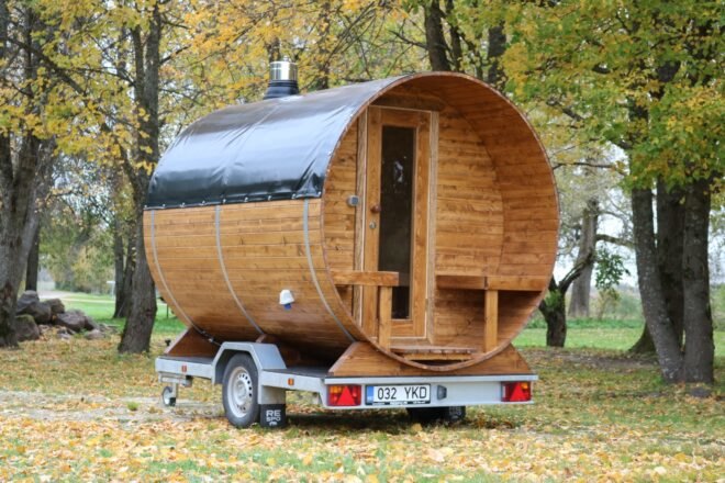 round wooden sauna on a trailer