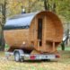 round wooden sauna on a trailer