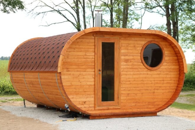 warm-toned oval wood sauna