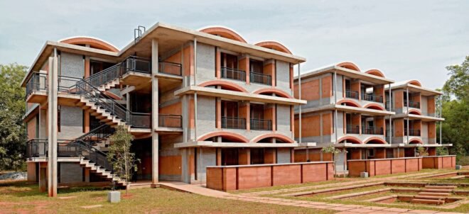 three-level brick housing complex with domed roofs