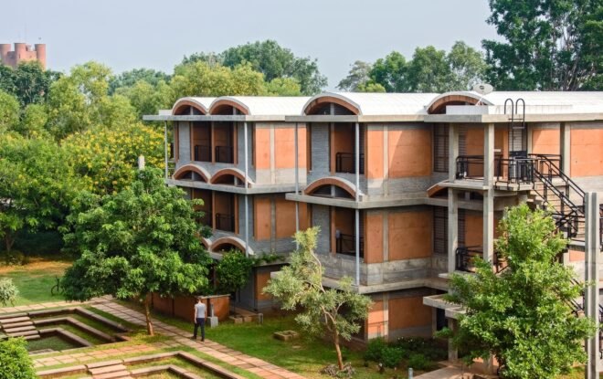 three-level brick housing complex with domed roofs