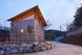 angled view of small home with angled roof