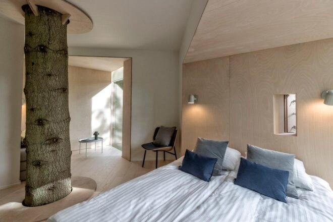 double bed inside treehouse