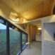 pine-clad tiny home interior with angled ceiling