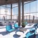 blue chairs in room with glass walls