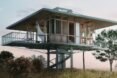 a single story house built on stilts