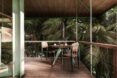 open-air deck with small dining table and chairs