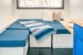 interior living space with bright blue sofa cushions