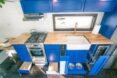 kitchen with bright blue cabinets
