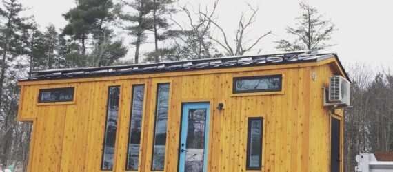 cedar-clad tiny home on wheels
