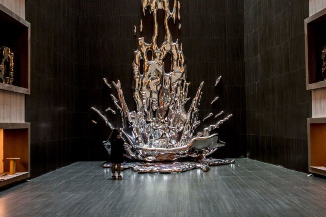 silver sculpture resembling splashing water