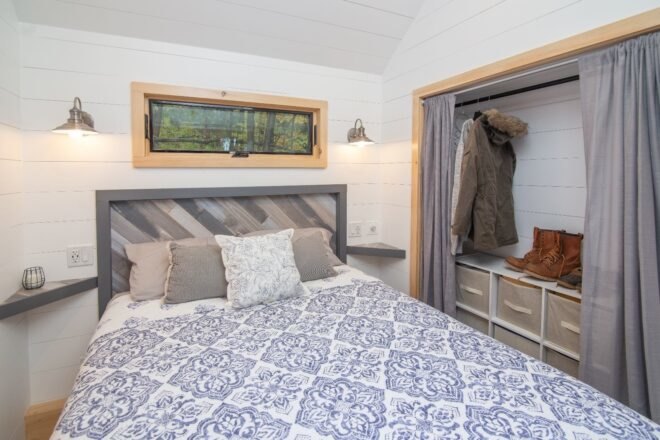 gray and white minimalist bedroom inside a tiny home