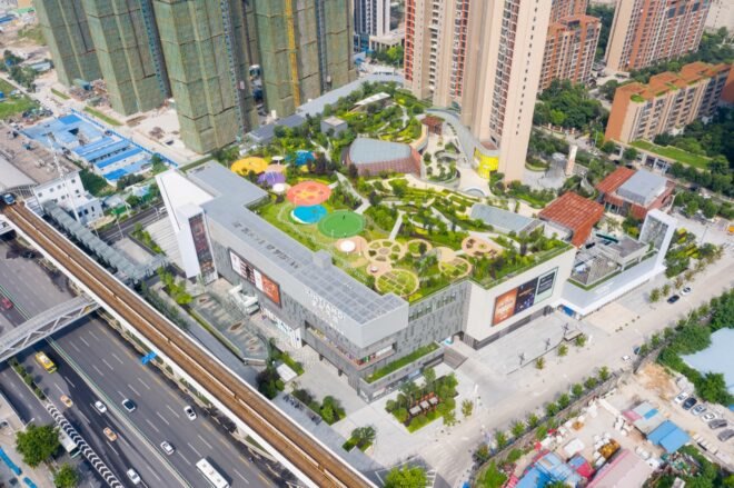aerial view of park and green space on top of a mall building