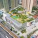 aerial view of park and green space on top of a mall building