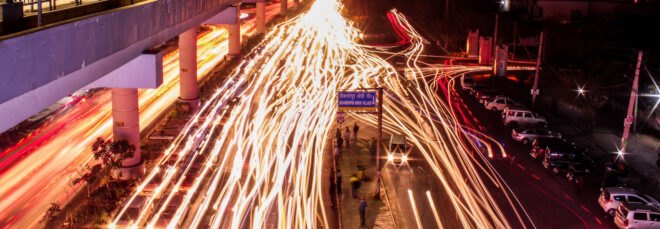 blurred lights of traffic in New Delhi at night