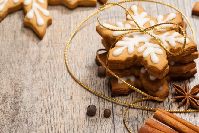 iced snowflake cookies tied in string