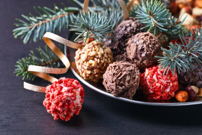 homemade truffle candies on a metal plate
