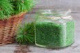Sea bath salt with pine extract in a glass jar