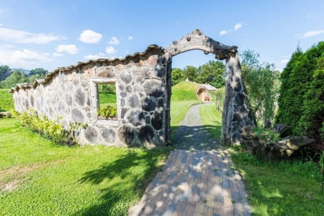stone fence leading to hobbit home