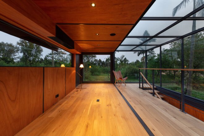 a warmly lit wood-paneled hallway