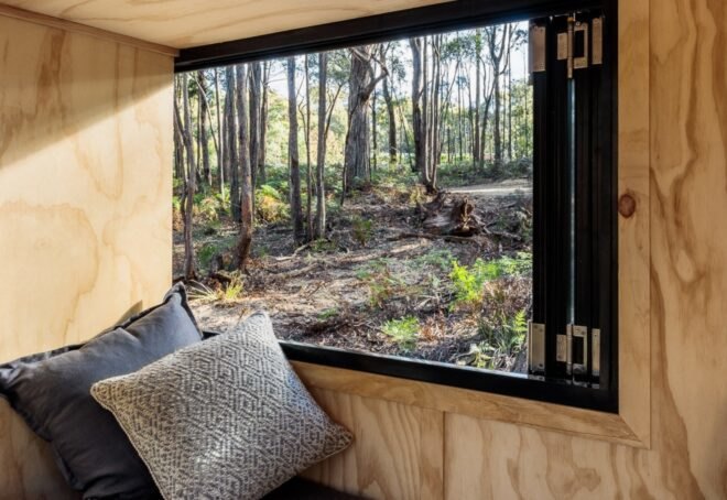 small bed with large window