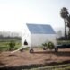 metallic chicken coop on wheels