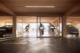 rendering of small cycling room surrounded by parking spaces