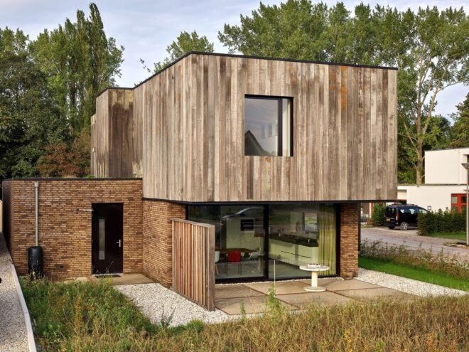 two-story brick and wood home