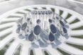 round and tear-drop shaped columns topped with solar panels