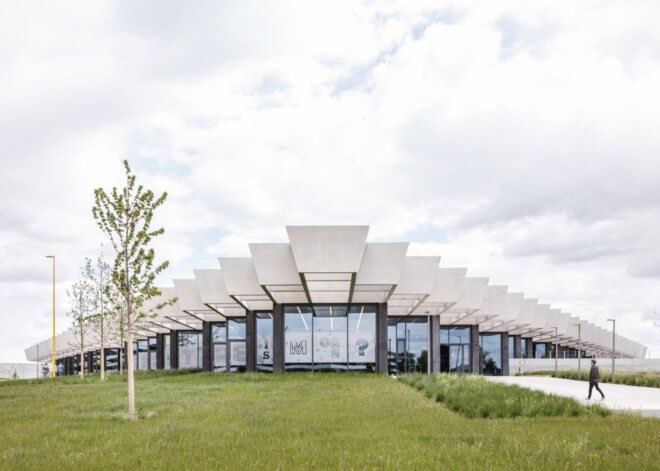 glass building with jagged roofline