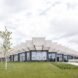 glass building with jagged roofline