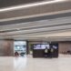 people looking at screens inside an office building