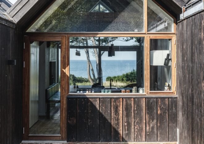 cabin with windows revealing views of the sea