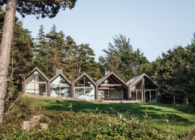 series of A-frame cabins with large windows