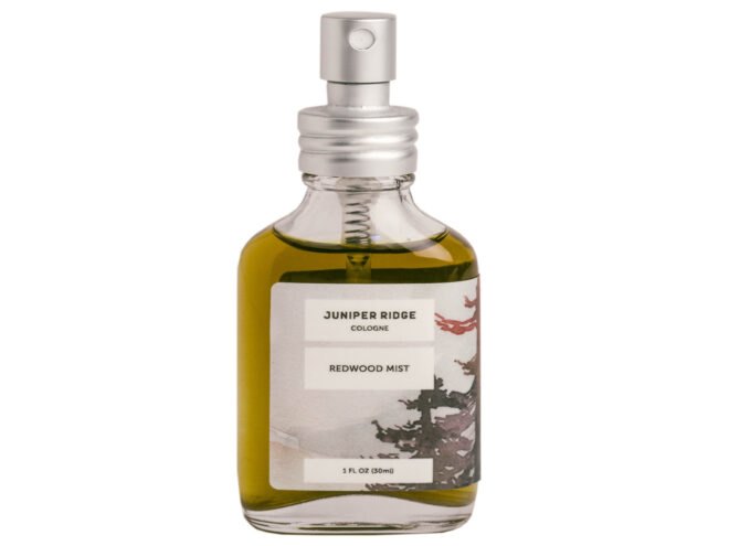 The front of a bottle of Juniper Ridge's Redwood Mist fragrance