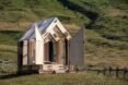 small cabin with transparent walls and roof