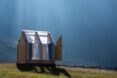 small cabin with transparent walls