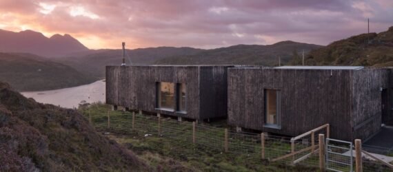 elongated timber home looking out over landscape